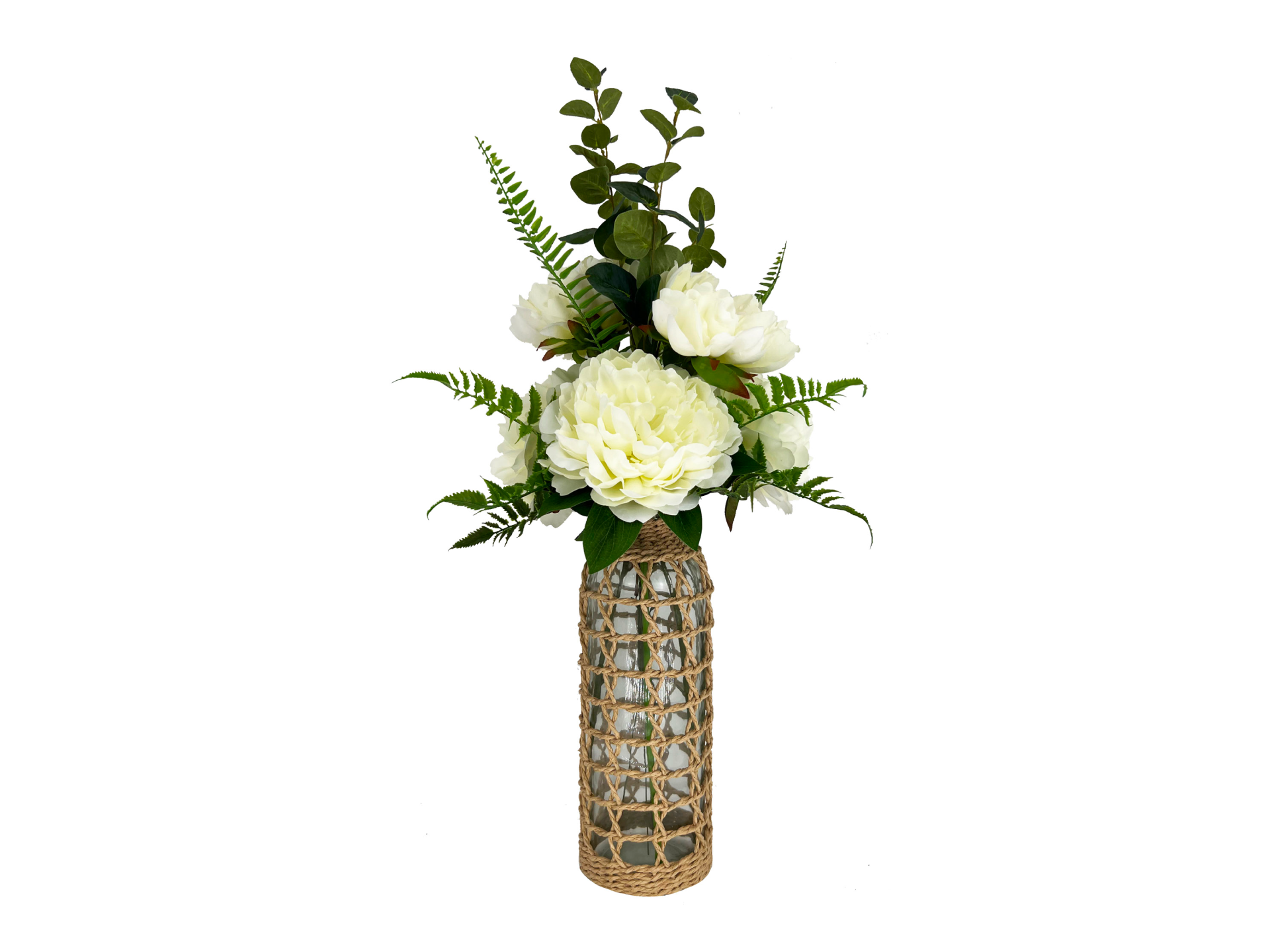 Big white flowers with green stems and leaves in tall glass vase with rope tied around it